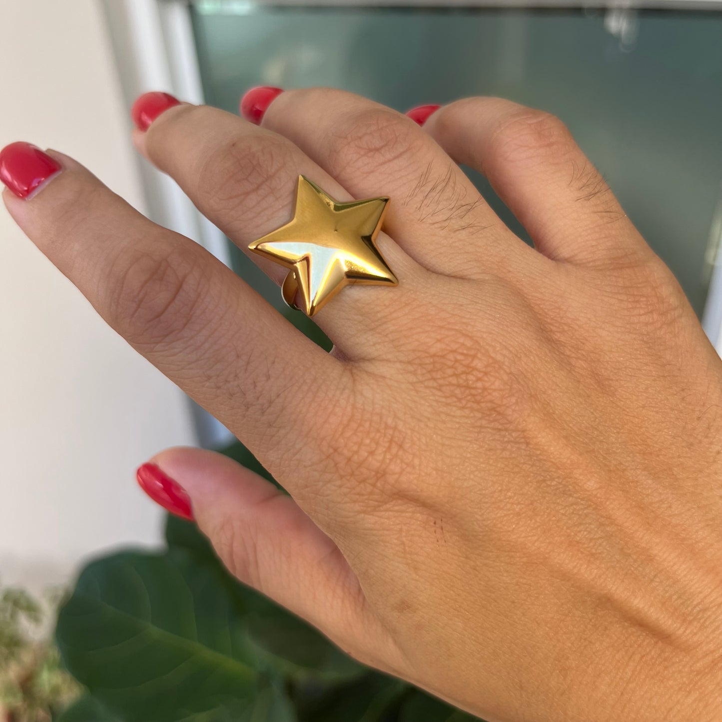 Anillo estrella de oro