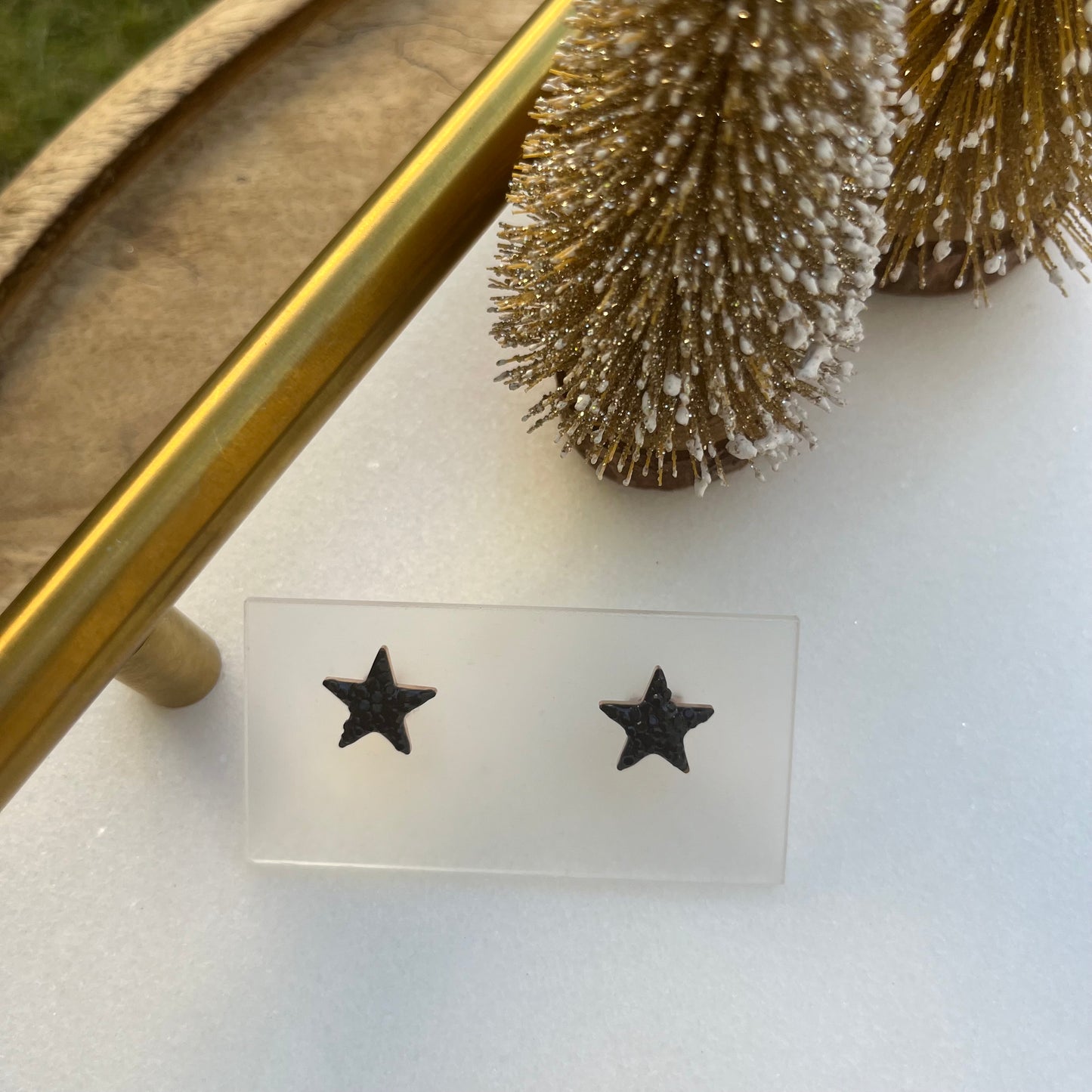 Aretes stud estrellas color oro rosa